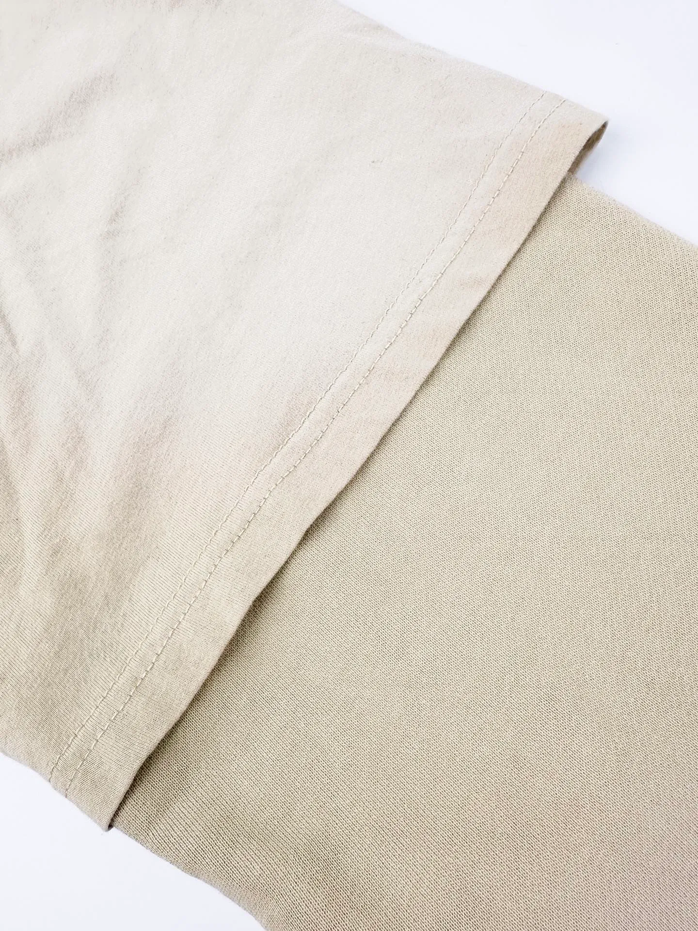 Acne Studios logo layered hooded sweatshirt. Customized double-condensed washed terry cotton. It is rich and silky, comfortable and skin-friendly. The body is dip-dyed with matte rice and apricot. The hazy matte texture flows through it. It expresses the cool and relaxed aristocratic temperament of Northern Europe. The neat hooded silhouette spreads a casual tone. Retro handwritten floral print on the chest is leisurely laid out. Recalling the brand's archive narrative rooted in Stockholm. Ingeniously constructed laminated sleeves. The staggered layers of replica short sleeves and long sleeves give the ready-to-wear a smart visual tension. It combines relaxed street style and Nordic minimalist core. It sheds the flashy appearance and interprets a reserved high-end dressing posture. Process 1: Adopt glue printing process. The chest printing has been modified three times with the film screen. Use glue liquid paint to print the pattern on the fabric. Bake the fabric to fix the printed pattern. Technique 2: Gradient distressing spray process by spraying dyes of different colors on the surface of the fabric. Realize that clothing can show rich color changes under different lights and increase visual layering. Process 3: Use layered fabrics to create fake two-piece splicing. Precision stitching is layered and locked. Long and short sleeves are overlapped and sewn. The seams are all edge-covered. Internal and external panels are seamlessly combined. One-piece molding presents staggered layers of short sleeves and long sleeves. Process 4: The fabrics have been fermented and washed. The hand feel and texture are better. Not easy to deform. Not easy to shrink. Not easy to fade. Maintain long-term beauty. Accessories: Customized 1:1 Acne trademark Fit: Loose fit Size: S M L XL Style number: CC 7005